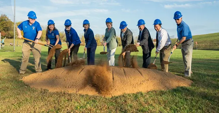 Dr. James Ball Athletics Complex Groundbreaking - Carroll News | Carroll Publications | Carroll County, MD Carroll Community College celebrates the groundbreaking of the Dr. James Ball Athletics Complex. Pictured from left to right: David O’Callaghan, Board Chairperson; Terri Leatherwood, Athletics Director; Dr. James Ball, Emeritus President; Dr. Rose Mince, President; Commissioner Susan Krebs; Commissioner Kenneth Kiler; Commissioner Tom Gordon; Steve Aquino, Foundation Board President; and Steve Wantz, Executive Director of Institutional Advancement & College Foundation.