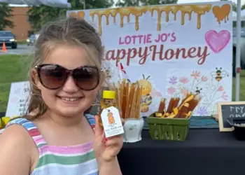 "Lottie Jo's Happy Honey" stand during the 2024 Hampstead Young Entrepreneur Holiday Expo
