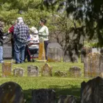 Graveyard Meeting_2.2 - Carroll News | Carroll Publications | Carroll County, MD The Sullivan family meets at the Jerusalem Lutheran Church cemetery after researching their family roots.