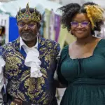 Craig-Sydney-Fryer - Carroll News | Carroll Publications | Carroll County, MD Two people pose at a costume market: a man in a royal blue and gold outfit with crown and scepter, and a woman in a green dress with glasses.